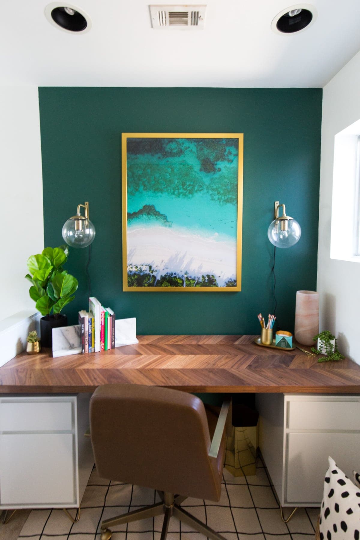 home office with bold green wall and ikea desk