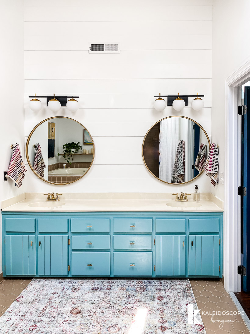 blue vanity in master bathroom