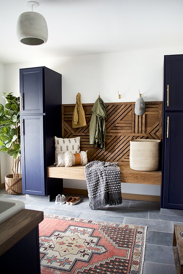 geometric wood bench in mudroom