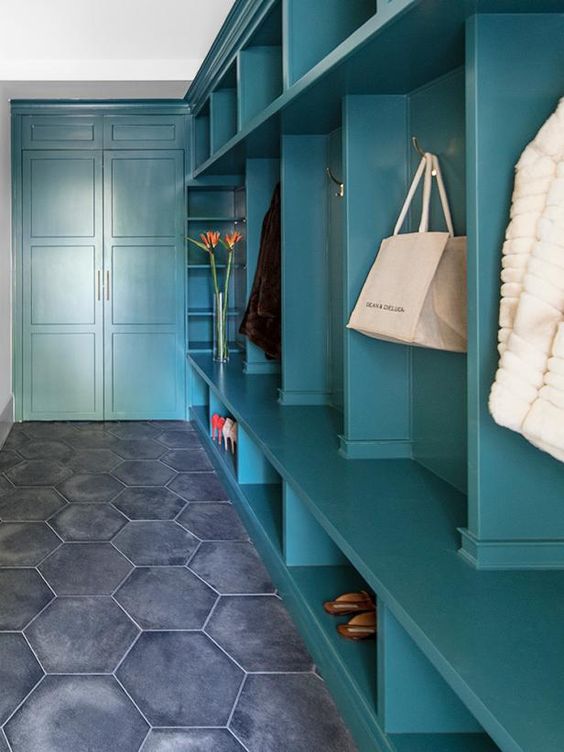 dark turquoise cubbies in mudroom