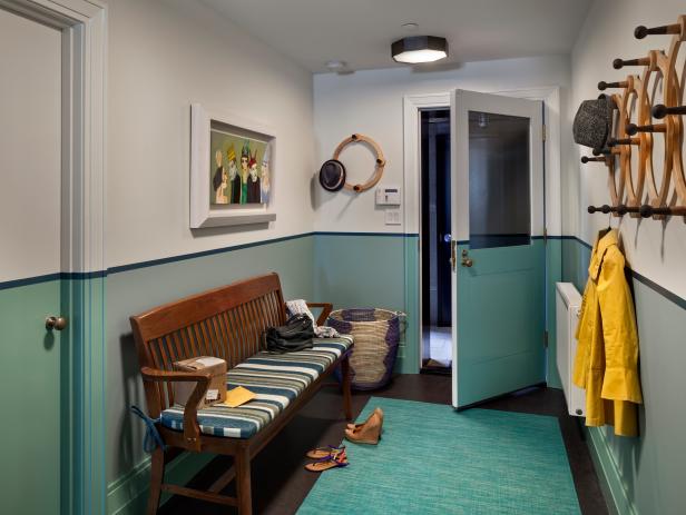 contrasting paint and outdoor rug in mudroom