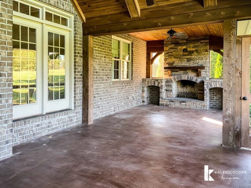 screened in porch with fireplace