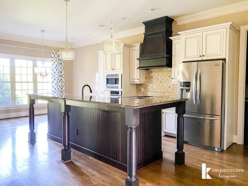 brown and dark wood open floor plan kitchen