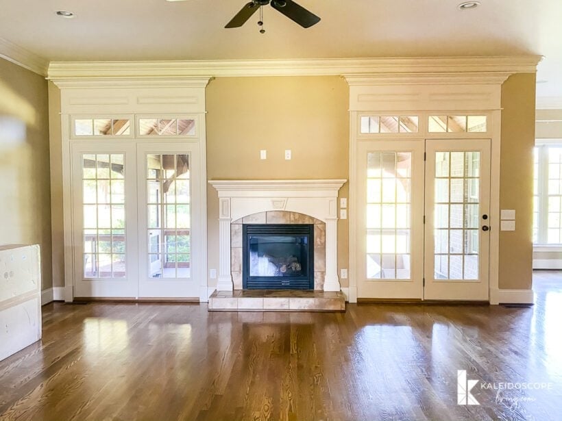 fireplace with double doors on both sides