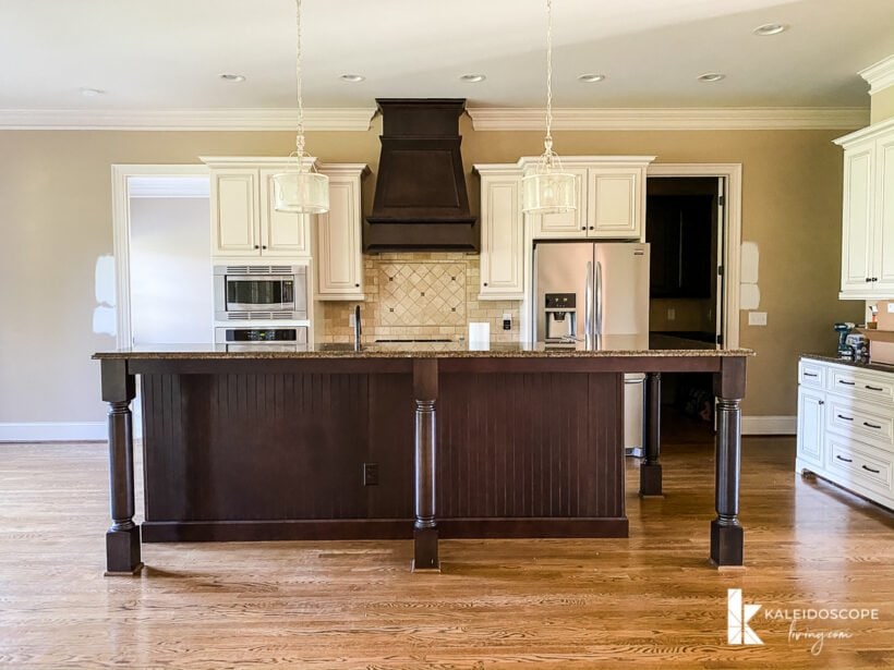 brown and dark wood open floor plan kitchen 