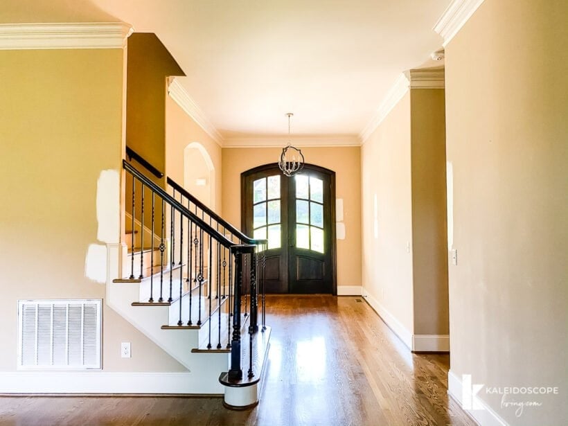 entryway with stairwell and double front doors