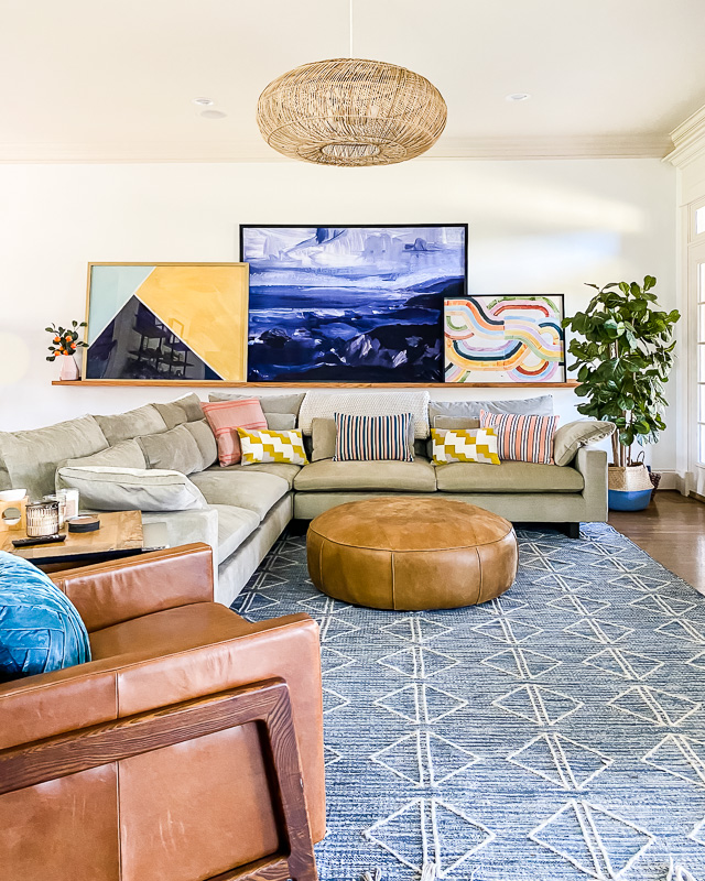 colorful living room with large art on ledge