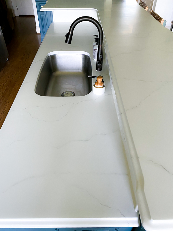 granite countertops painted to look like honed marble