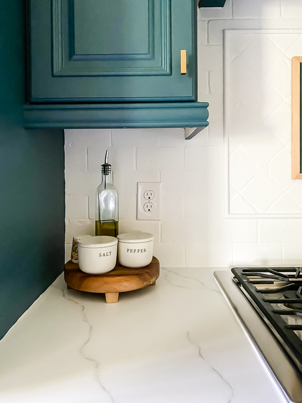 marble painted kitchen countertops after caulking by Tasha Agruso of Kaleidoscope Living