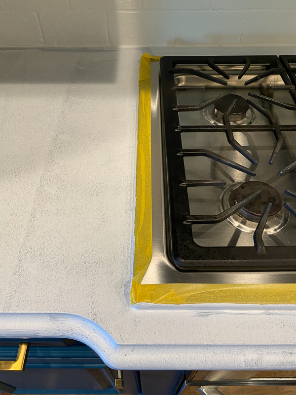 taped off stovetop for painting countertops by Tasha Agruso of Kaleidoscope Living