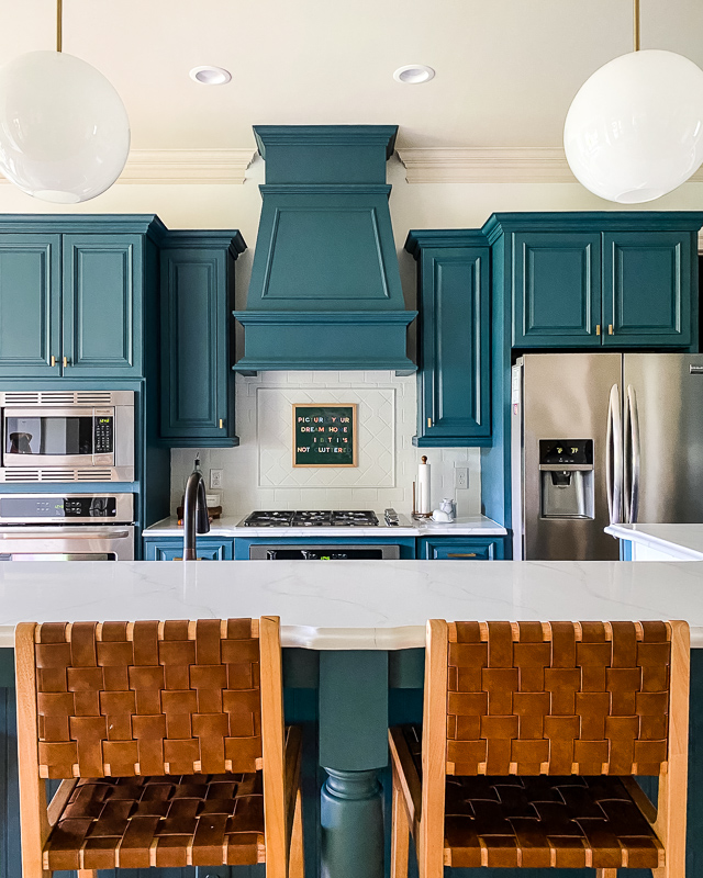 painted backsplash in blue kitchen