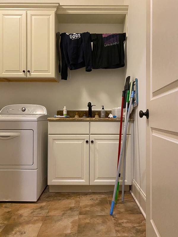 outdated laundry room before makeover