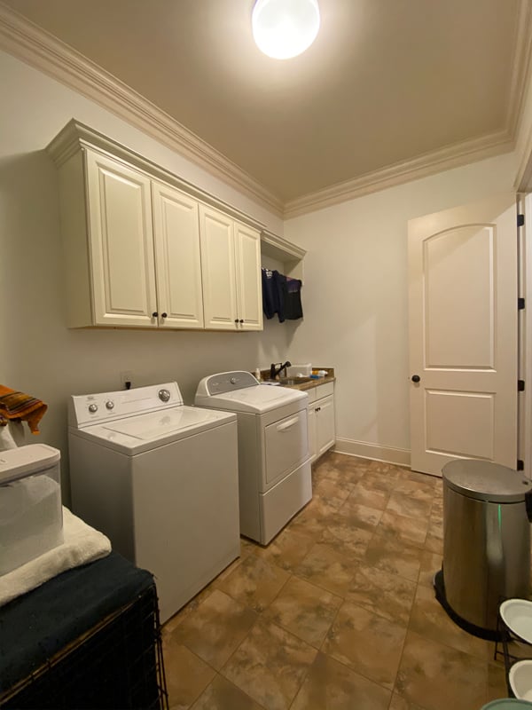 outdated laundry room before makeover