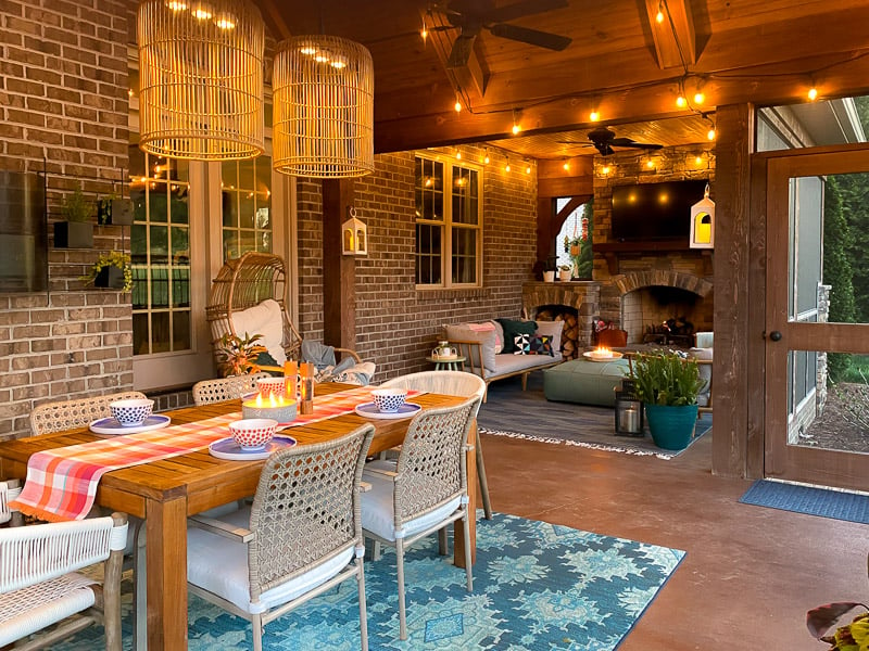 screened-in-porch with string lights at night