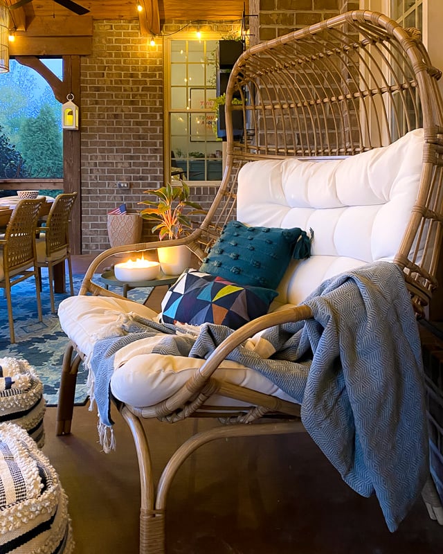 screened-in-porch with string lights at night