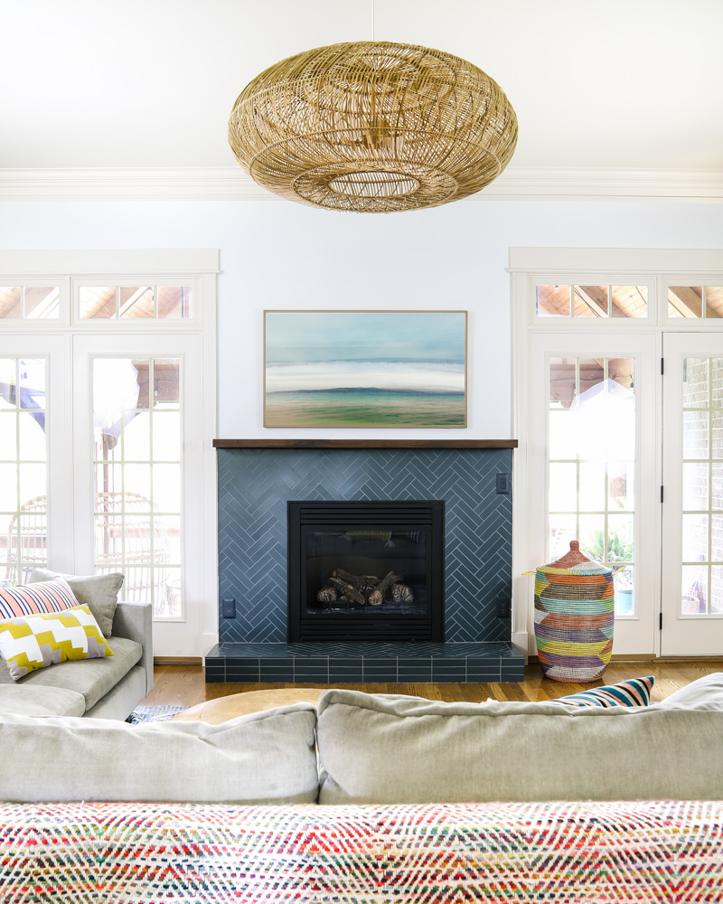 family room with navy tile fireplace