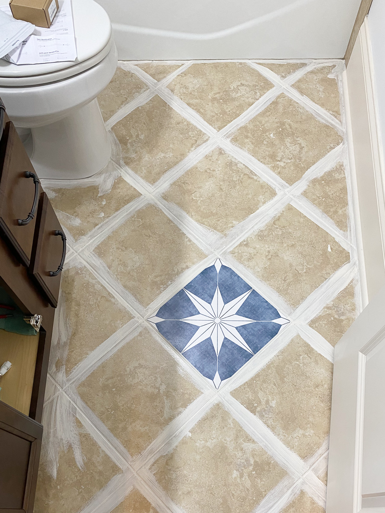 installing tile stickers on bathroom floor