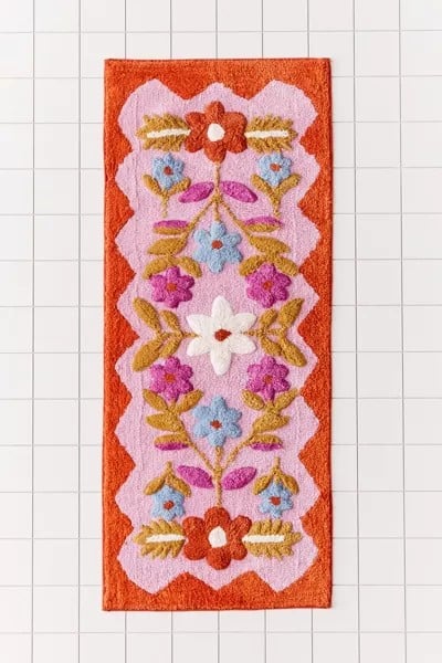 folk floral bathmat in pink and orange