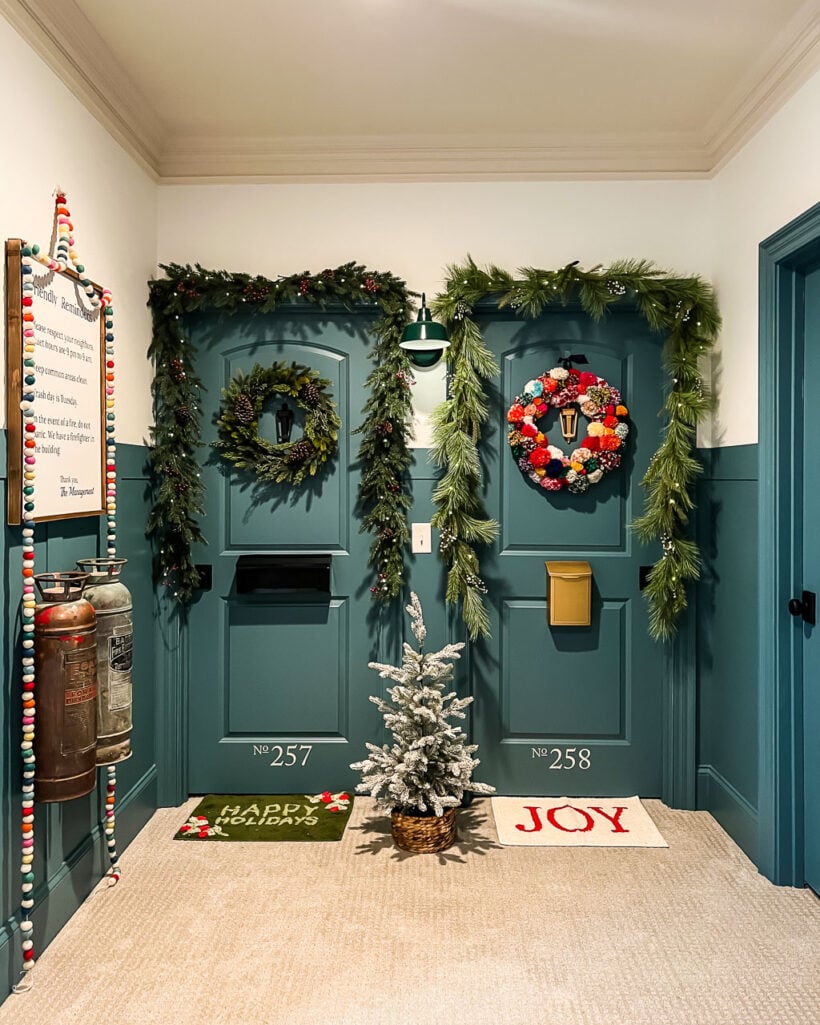 bedroom doors that look like apartment doors decorated for Christmas