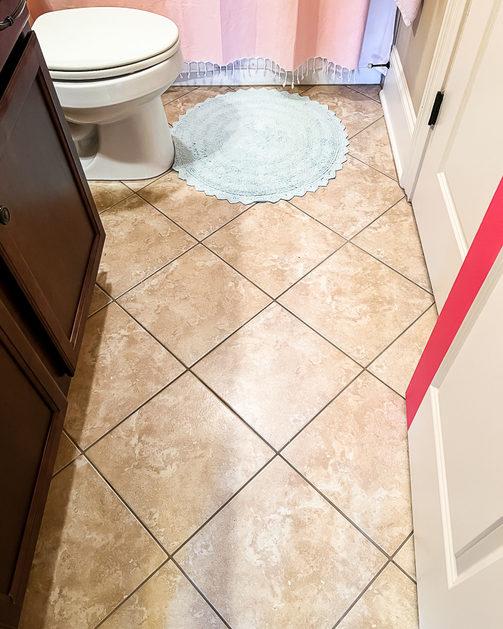 outdated brown bathroom floor tile