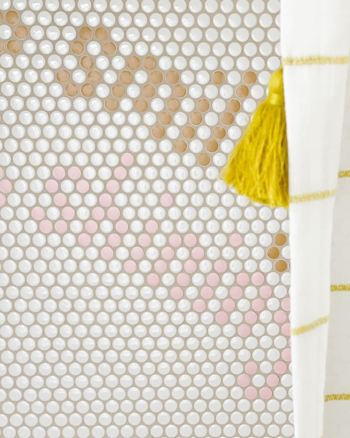 white penny tile in shower