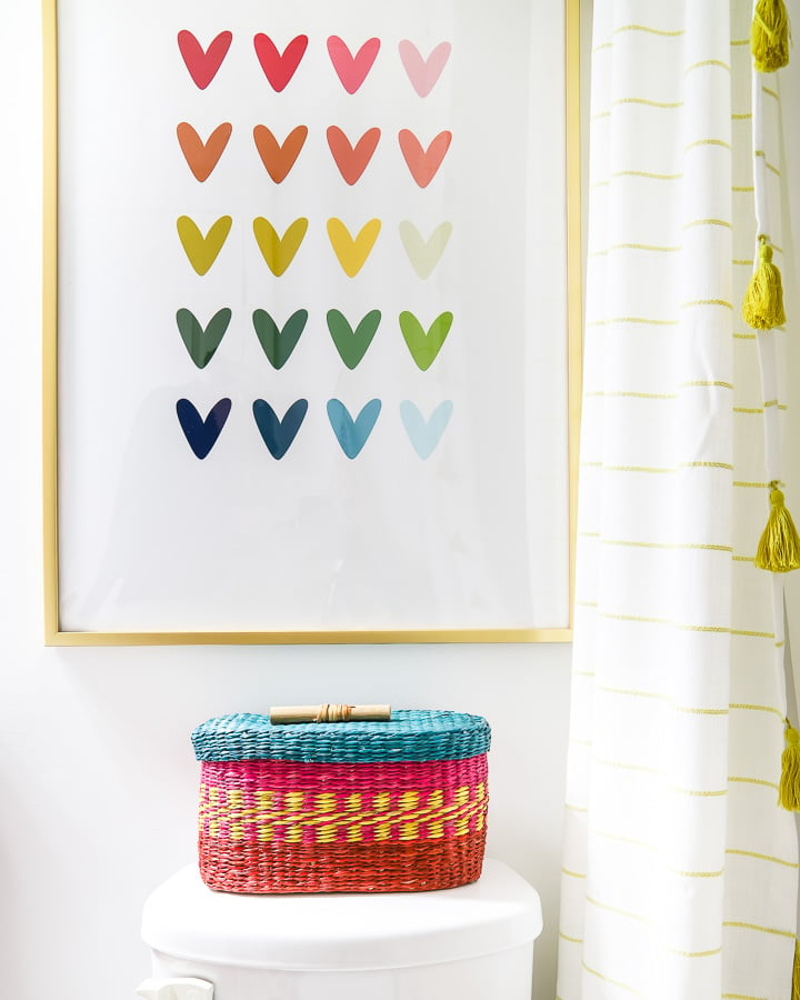 colorful rainbow decor in girl's bathroom