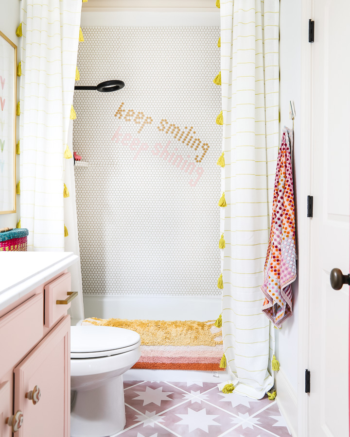 colorful pink and yellow girl's bathroom