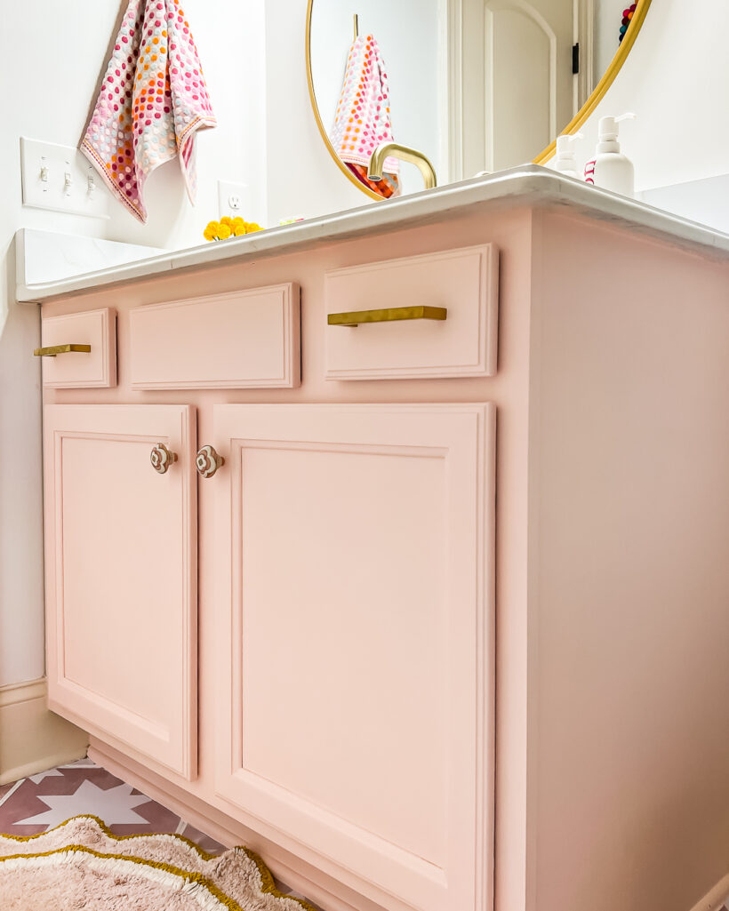 light pink vanity in girl's bathroom