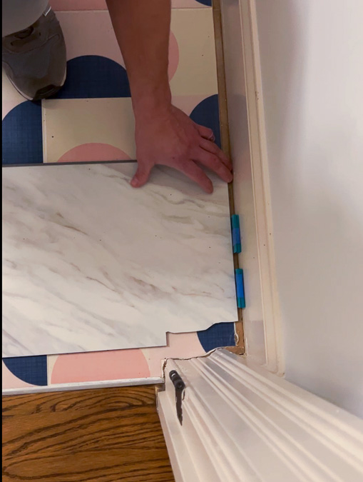 trim luxury vinyl tile to fit under door casings