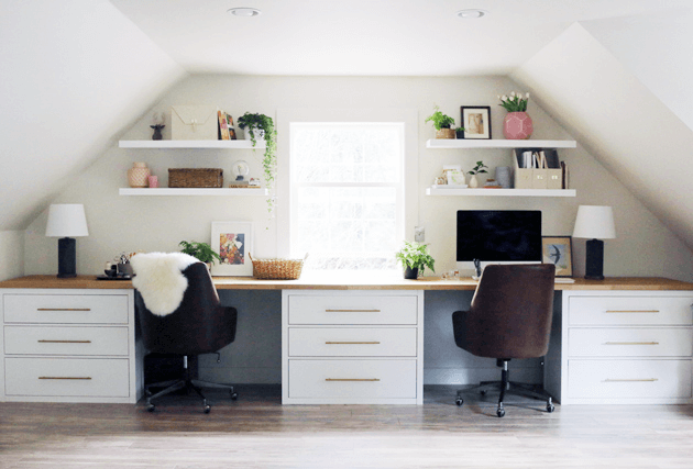 IKEA desk hack with open shelving and leather desk chairs