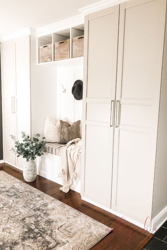 beige mudroom created with pax built-ins 