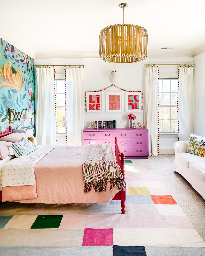 9' x 12' rug under full size bed in colorful girl's bedroom