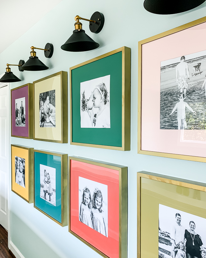 colorful hallway gallery wall of family photos