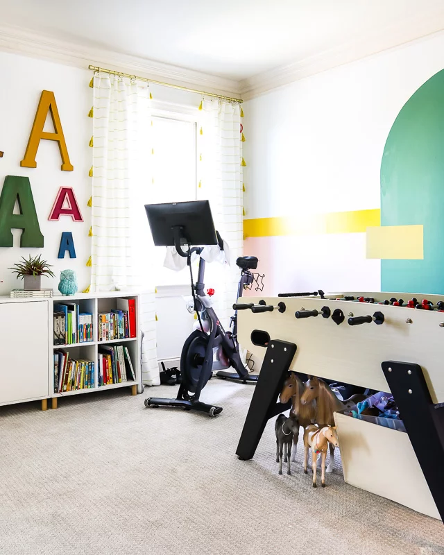 bonus room ideas- colorful bonus room with foosball table by Tasha Agruso of Kaleidoscope Living