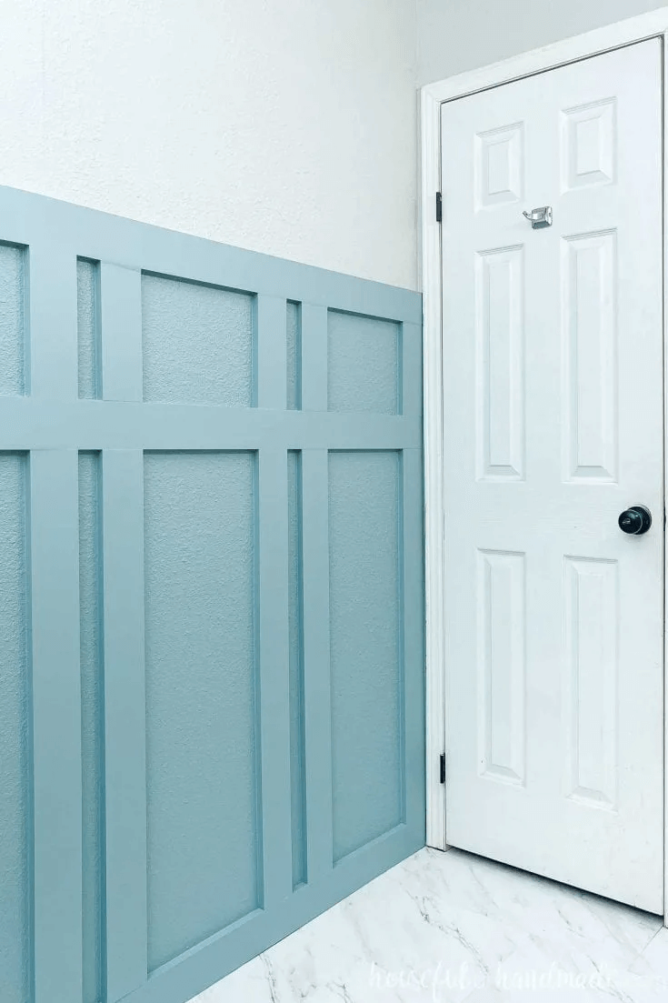 board and batten over a textured wall