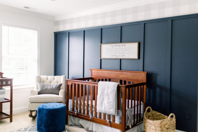 nursery with blue board and batten and wallpaper