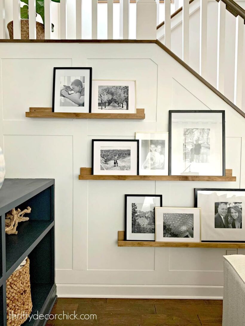 board and batten with photo ledges on a stair wall