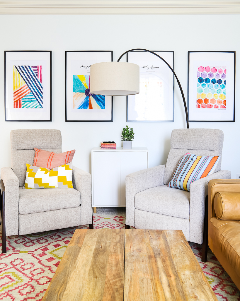 stylish modern fabric recliners in bonus room by Tasha Agruso of Kaleidoscope Living