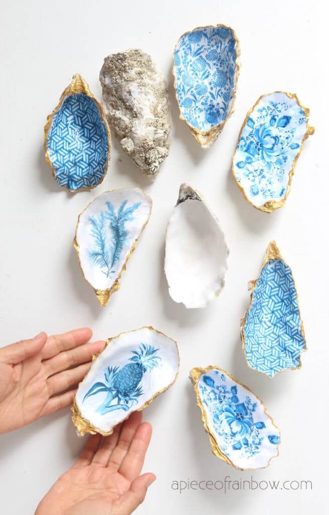blue and white decoupaged oyster shell trinket dish