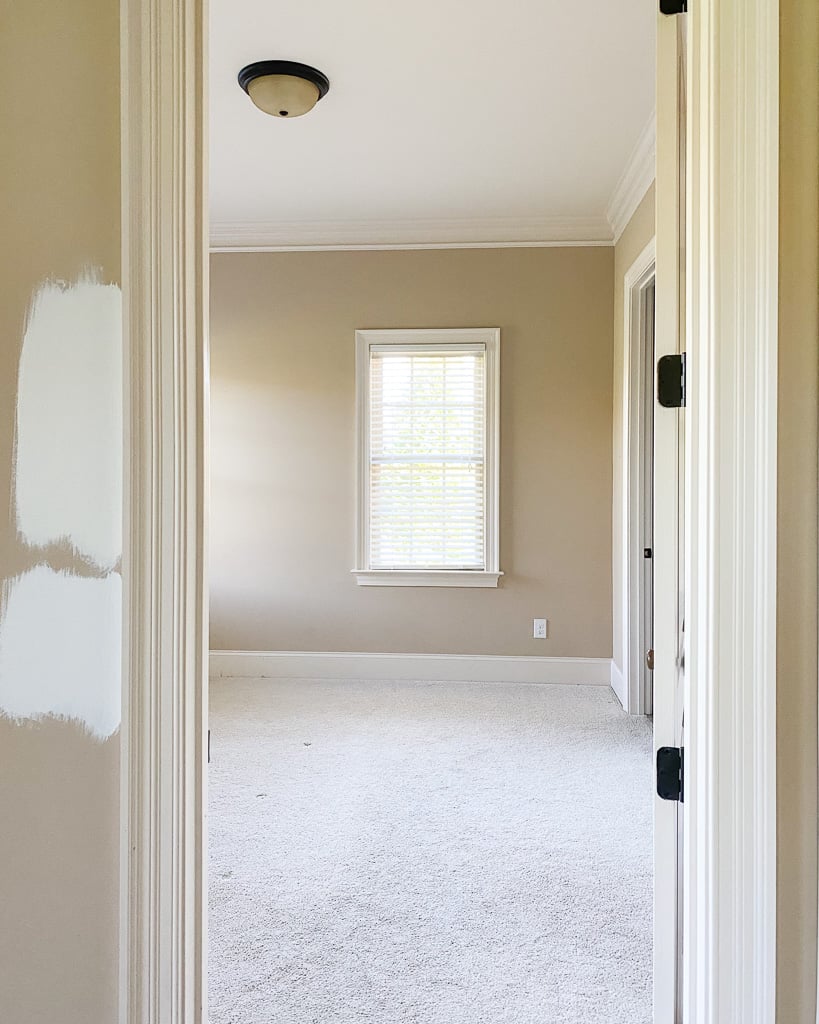 I am moving into this house, and it has wood trim everywhere. I wanted to  tone down some of the wood trim and paint a bright white and a nice neutral  color