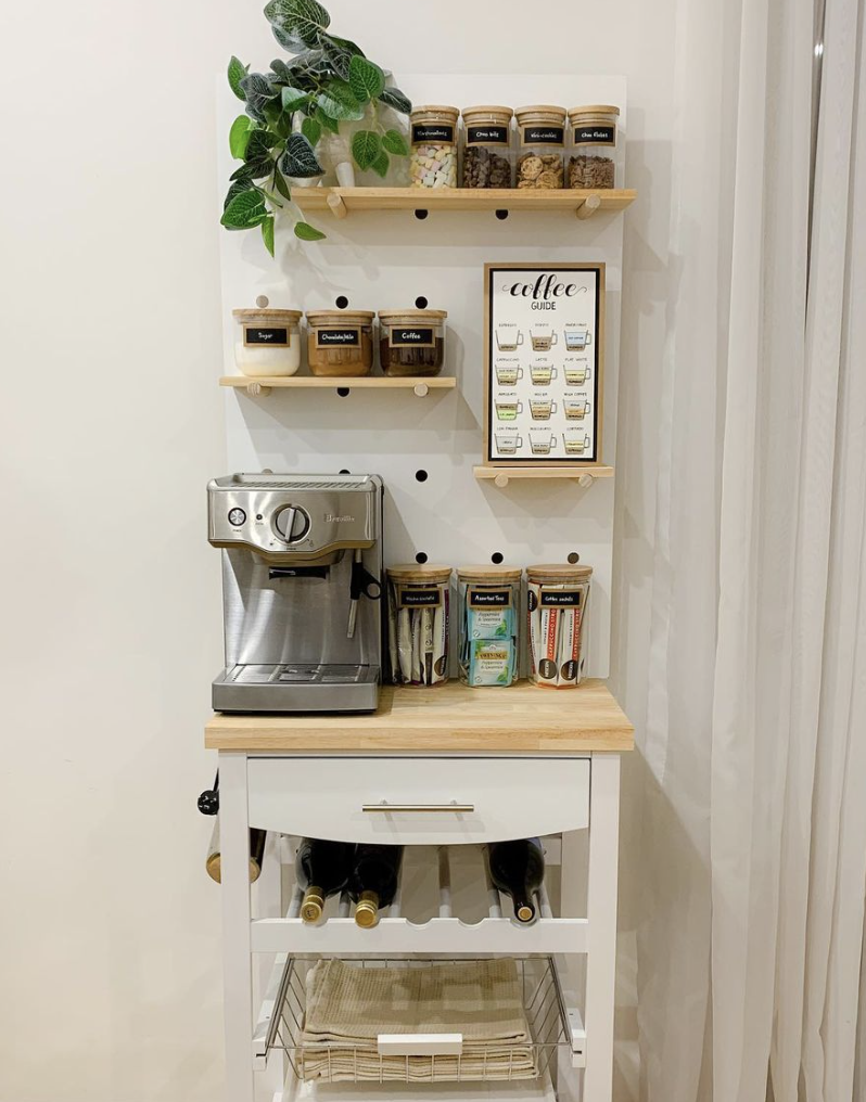 pegboard storage and shelves above coffee cart