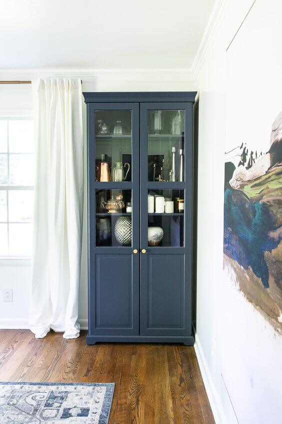 navy IKEA cabinet in dining room
