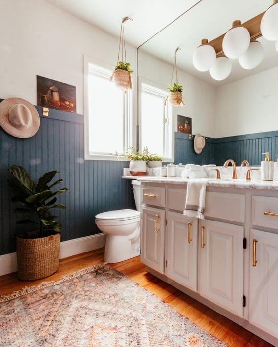 blue green wainscoting in bathroom