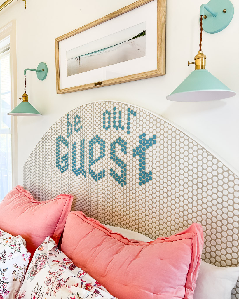 guest room with DIY tile headboard that says be our guest