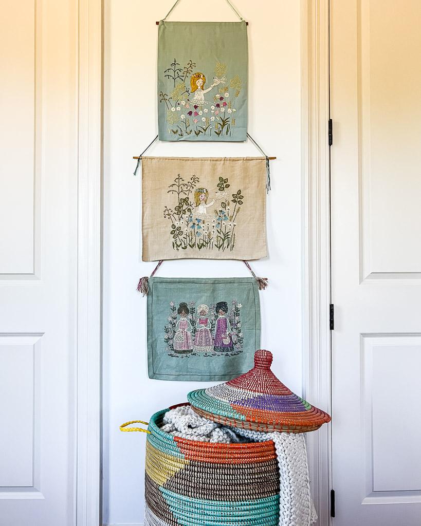 vintage embroidered art and African basket