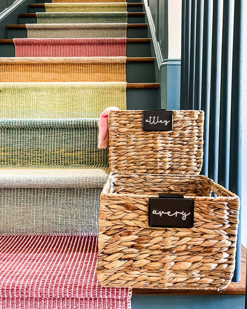 name labels made with Cricut Joy for water hyacinth baskets on stairs