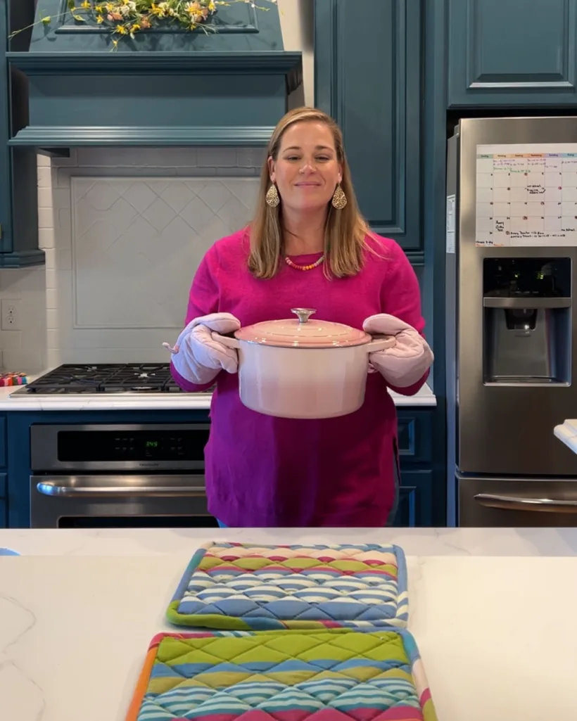 Wayfair kitchen essentials- Photo of Tasha Agruso of Kaleidoscope Living holding affordable Dutch oven