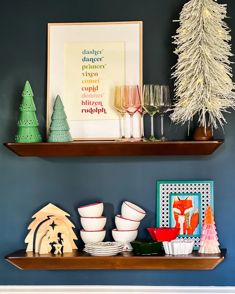decorating dining room for Christmas with seasonal artwork and holiday dishes by Tasha Agruso of Kaleidoscope Living