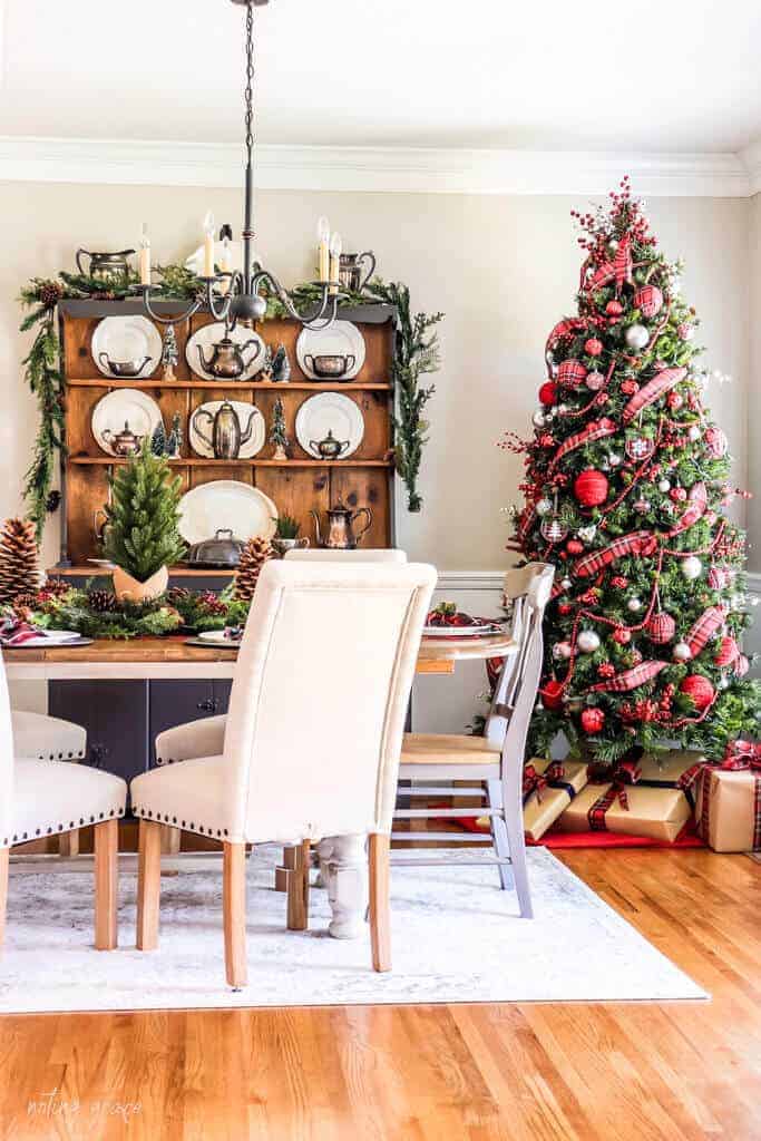 traditional dining room decorated with red and green for Christmas