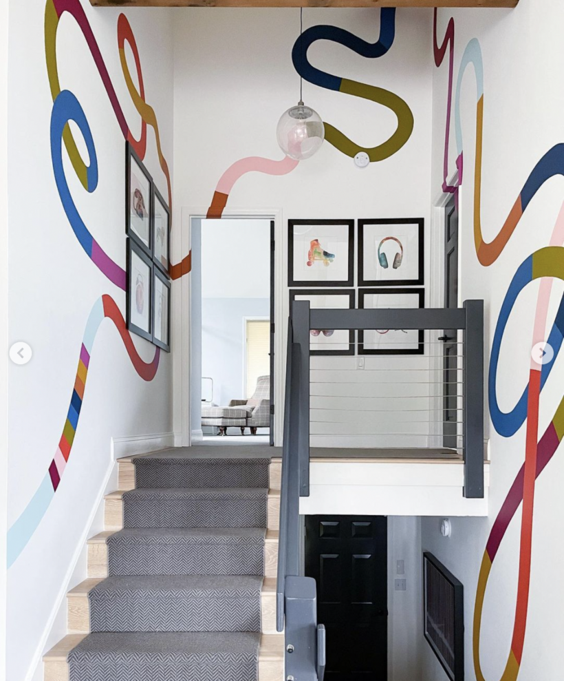 stairwell with floor to ceiling color blocked squiggle wall mural 